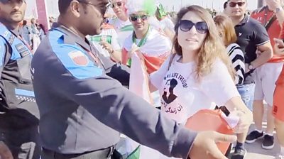 Woman wearing Mahsa Amini top stopped at World Cup game